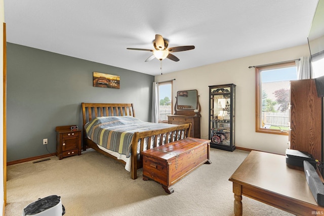 1108 Willen Ln, Fort Wayne, IN 46818 - bedroom featuring light colored carpet and ceiling fan