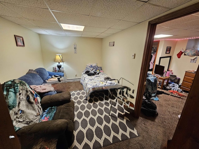 295-297 W Main St, Wabash, IN 46992 - carpeted living area featuring a paneled ceiling and a baseboard heating unit