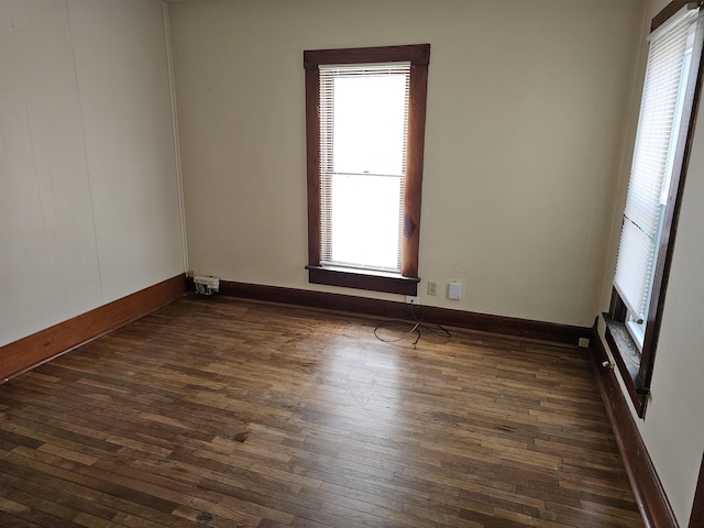 295-297 W Main St, Wabash, IN 46992 - empty room featuring plenty of natural light and dark wood-style flooring