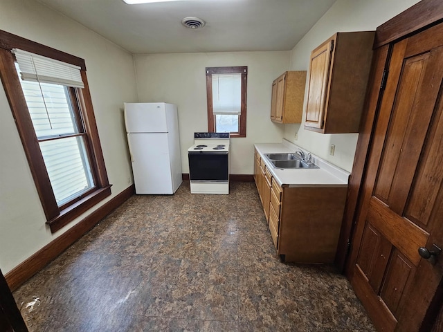 295-297 W Main St, Wabash, IN 46992 - kitchen with white appliances, plenty of natural light, and light countertops
