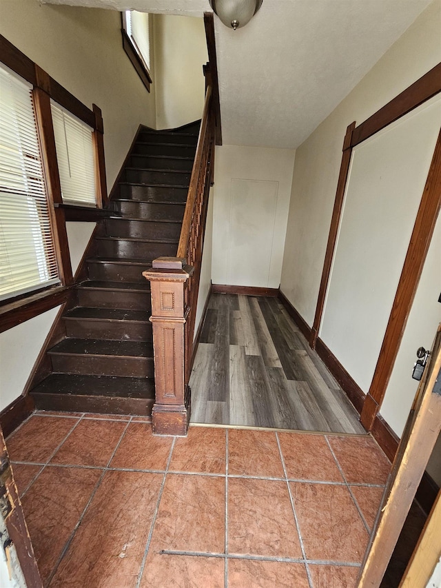 295-297 W Main St, Wabash, IN 46992 - stairway with baseboards and wood finished floors