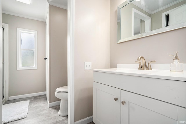 17725 Douglas Rd, South Bend, IN 46635 - bathroom featuring crown molding, vanity, and wood finished floors
