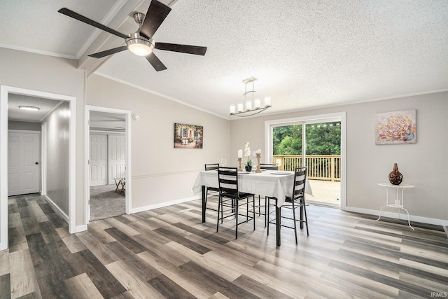 17725 Douglas Rd, South Bend, IN 46635 - dining room featuring ornamental molding, wood finished floors, vaulted ceiling, ceiling fan, and a textured ceiling