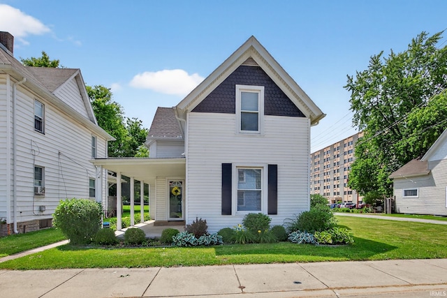 119 Towle Ave, Mishawaka, IN 46544 - victorian-style house with a front lawn