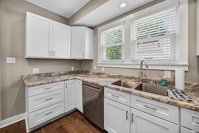 119 Towle Ave, Mishawaka, IN 46544 - kitchen with stainless steel dishwasher, dark wood-style flooring, white cabinets, recessed lighting, and light stone countertops