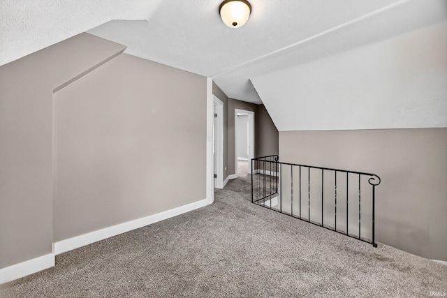 119 Towle Ave, Mishawaka, IN 46544 - additional living space with carpet flooring and vaulted ceiling