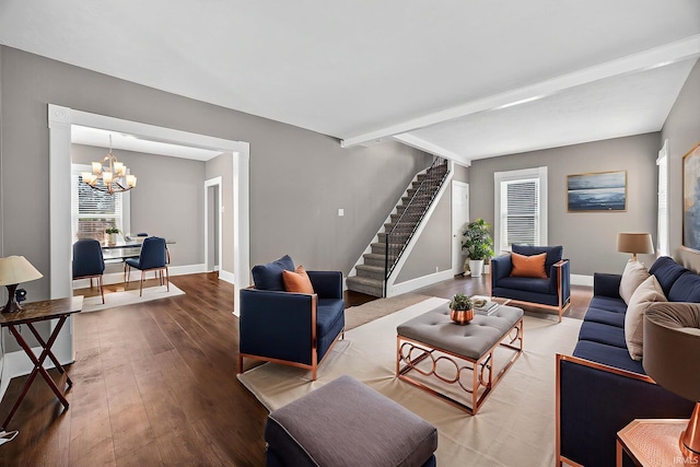 119 Towle Ave, Mishawaka, IN 46544 - living room featuring stairs, a chandelier, and wood finished floors
