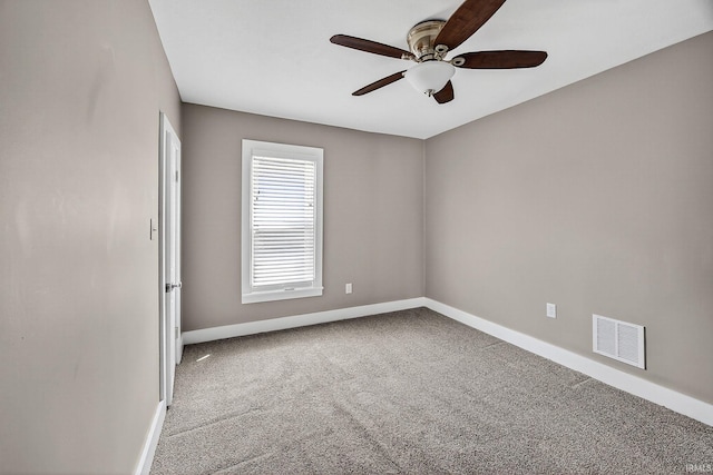 119 Towle Ave, Mishawaka, IN 46544 - spare room featuring a ceiling fan and carpet flooring