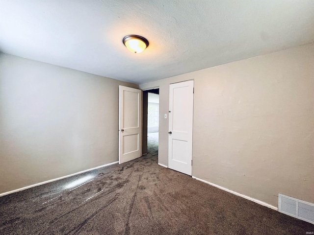 1106 W Rose St, South Bend, IN 46616 - spare room featuring carpet floors and baseboards