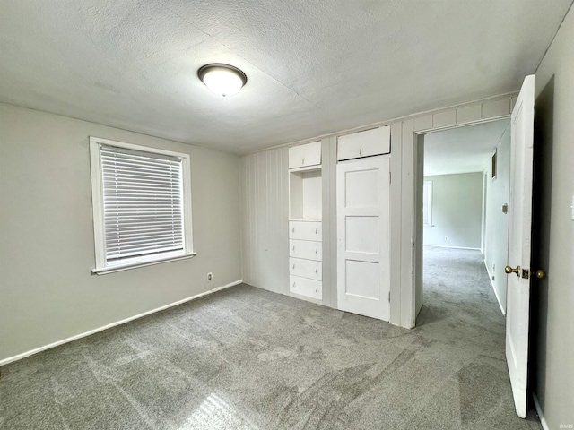 1106 W Rose St, South Bend, IN 46616 - unfurnished bedroom with carpet and a textured ceiling