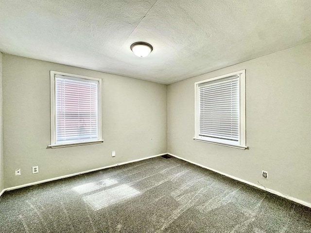 1106 W Rose St, South Bend, IN 46616 - carpeted spare room featuring baseboards and a textured ceiling