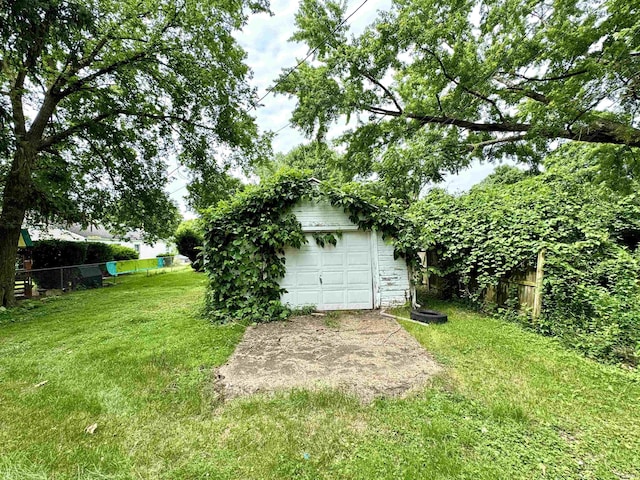 1106 W Rose St, South Bend, IN 46616 - view of yard with an outbuilding and a detached garage