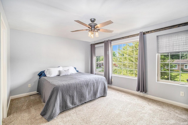 11999 Loughlin Dr, Mishawaka, IN 46545 - bedroom with carpet floors and ceiling fan