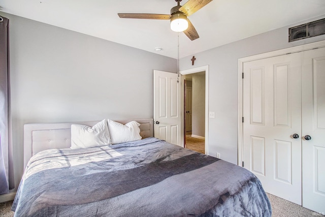 11999 Loughlin Dr, Mishawaka, IN 46545 - bedroom with carpet flooring, a ceiling fan, and a closet