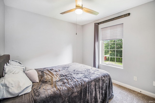 11999 Loughlin Dr, Mishawaka, IN 46545 - bedroom featuring light colored carpet and a ceiling fan