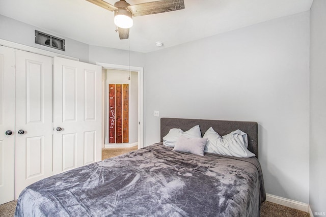 11999 Loughlin Dr, Mishawaka, IN 46545 - carpeted bedroom with a ceiling fan and a closet