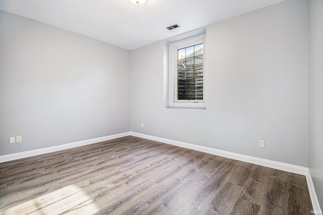 11999 Loughlin Dr, Mishawaka, IN 46545 - spare room with wood finished floors and baseboards
