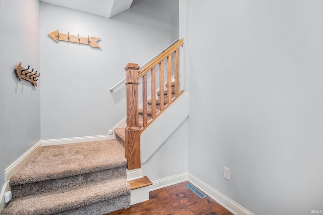 11999 Loughlin Dr, Mishawaka, IN 46545 - stairs with baseboards and wood finished floors
