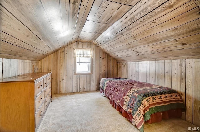 1049 Chapman Lake Dr, Warsaw, IN 46582 - bedroom with wooden walls, vaulted ceiling, light carpet, and wood ceiling