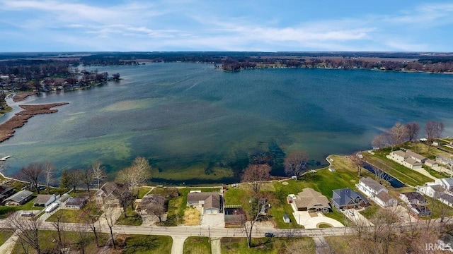 1049 Chapman Lake Dr, Warsaw, IN 46582 - aerial view of property's location with nearby suburban area and a large body of water