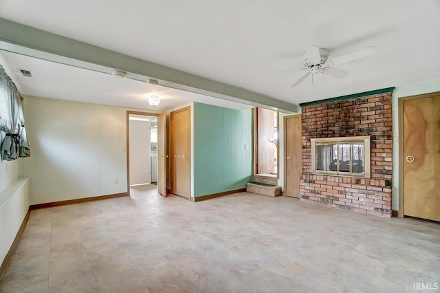 1049 Chapman Lake Dr, Warsaw, IN 46582 - unfurnished living room with a ceiling fan and a brick fireplace