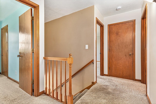 51268 Channel Ct, Elkhart, IN 46514 - corridor featuring carpet floors and an upstairs landing