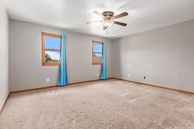 51268 Channel Ct, Elkhart, IN 46514 - empty room with a ceiling fan and light carpet