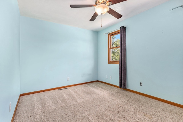 51268 Channel Ct, Elkhart, IN 46514 - carpeted empty room with baseboards and ceiling fan