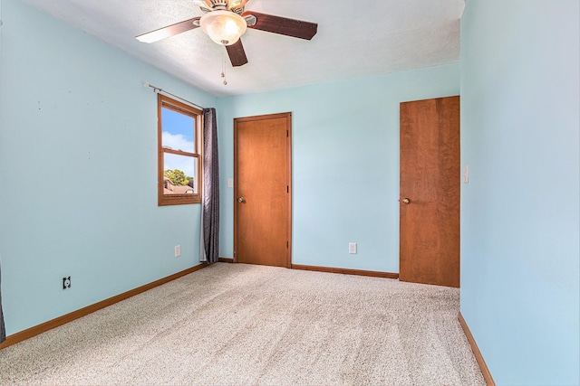 51268 Channel Ct, Elkhart, IN 46514 - carpeted empty room featuring a ceiling fan and baseboards