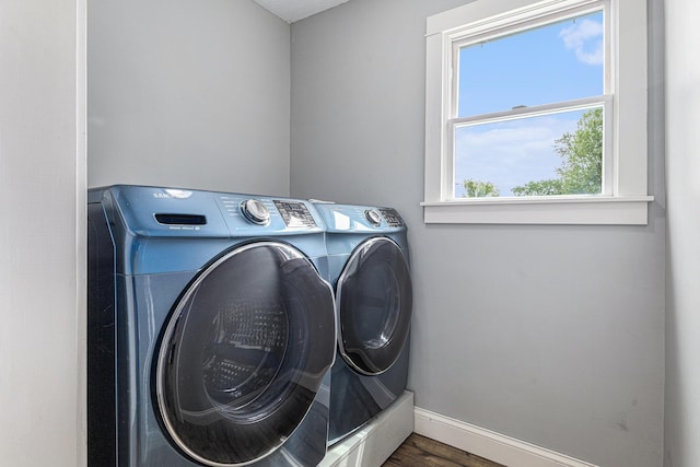 51268 Channel Ct, Elkhart, IN 46514 - washroom with washer and dryer and wood finished floors
