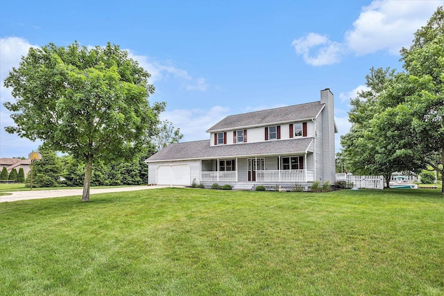 51268 Channel Ct, Elkhart, IN 46514 - view of front of house with a porch, a chimney, an attached garage, concrete driveway, and a front yard