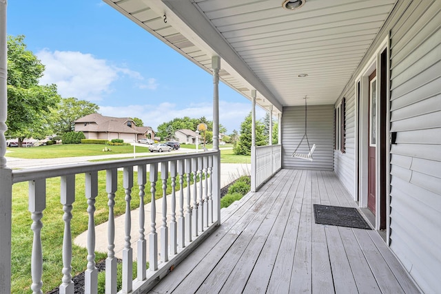 51268 Channel Ct, Elkhart, IN 46514 - wooden porch with a residential view and a yard