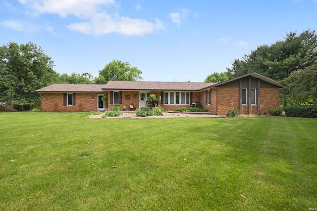 16123 County Road 18, Goshen, IN 46528 - single story home featuring a front lawn and brick siding