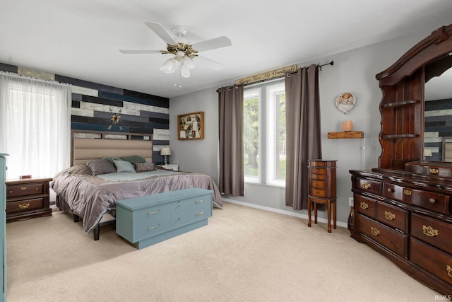 16123 County Road 18, Goshen, IN 46528 - bedroom with light colored carpet, an accent wall, and a ceiling fan