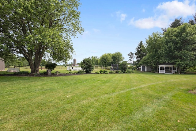 16123 County Road 18, Goshen, IN 46528 - view of green lawn with an outbuilding