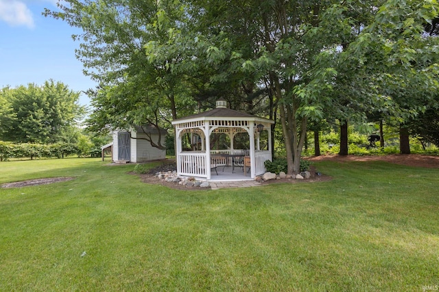 16123 County Road 18, Goshen, IN 46528 - view of grassy yard featuring a gazebo and a shed
