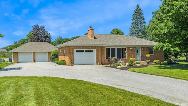 1123 E Gump Rd, Fort Wayne, IN 46845 - ranch-style house with a chimney, a front lawn, brick siding, roof with shingles, and a detached garage