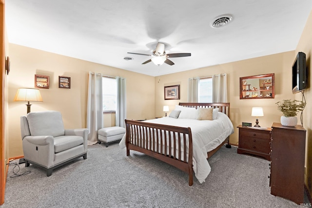 1123 E Gump Rd, Fort Wayne, IN 46845 - carpeted bedroom with multiple windows and a ceiling fan