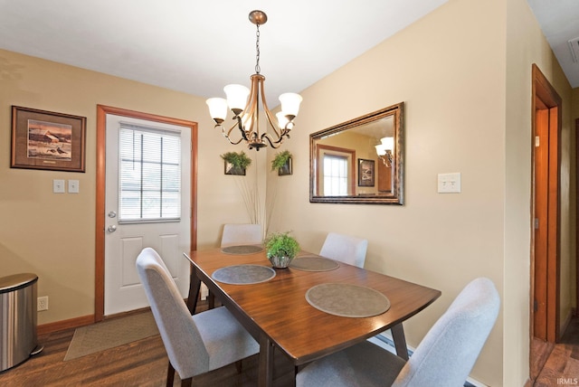 1123 E Gump Rd, Fort Wayne, IN 46845 - dining space featuring dark wood-style floors and a chandelier