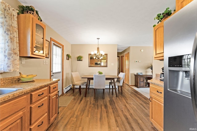 1123 E Gump Rd, Fort Wayne, IN 46845 - dining room with dark wood-type flooring and a chandelier