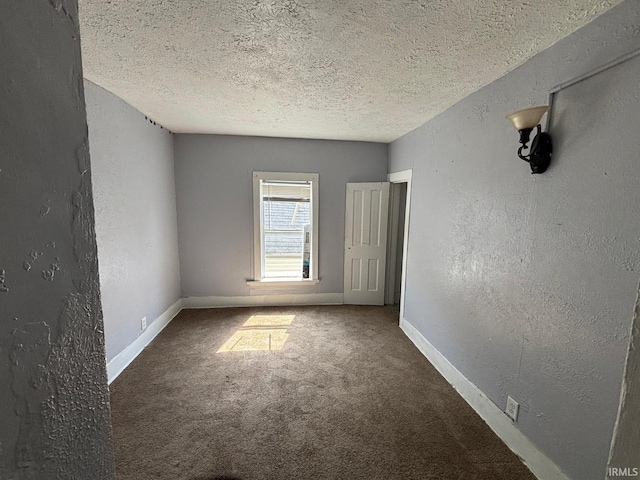 2307 Linden Ave, South Bend, IN 46628 - unfurnished room with a textured ceiling, a textured wall, and carpet floors