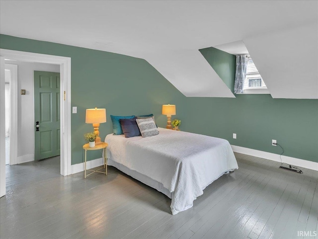 1310 W Jefferson Blvd, Fort Wayne, IN 46802 - bedroom with wood-type flooring and lofted ceiling