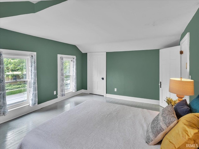 1310 W Jefferson Blvd, Fort Wayne, IN 46802 - bedroom with wood finished floors and vaulted ceiling