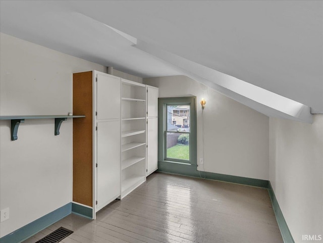 1310 W Jefferson Blvd, Fort Wayne, IN 46802 - additional living space with baseboards and light wood-type flooring