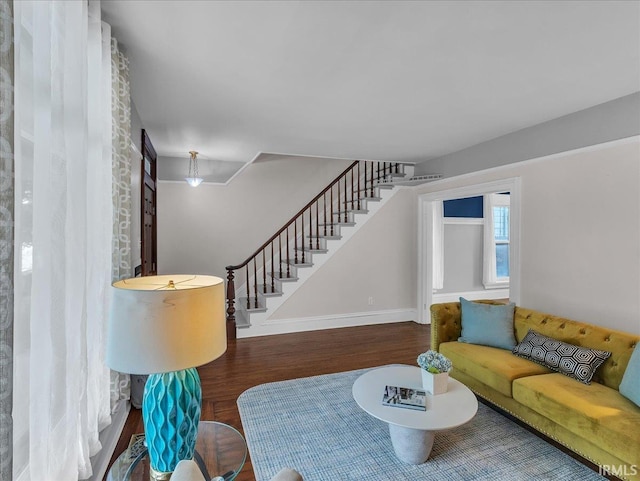 1310 W Jefferson Blvd, Fort Wayne, IN 46802 - living area with wood finished floors and stairway