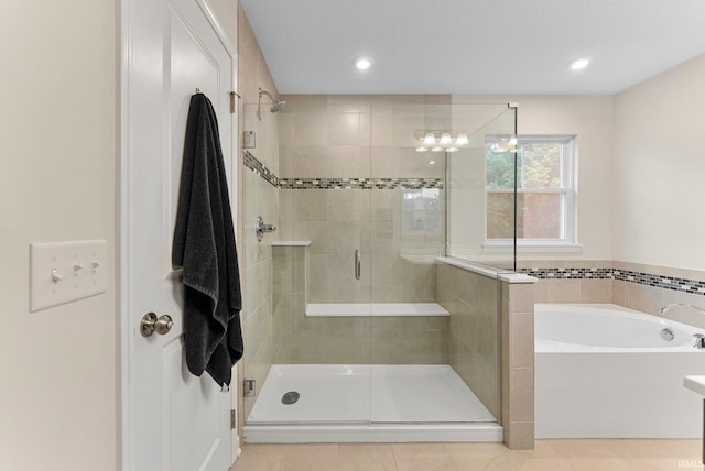 1114 Mosaic St, Huntertown, IN 46748 - full bath with a stall shower, a bath, tile patterned flooring, and recessed lighting