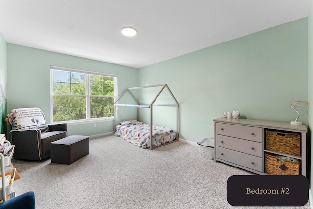 1114 Mosaic St, Huntertown, IN 46748 - bedroom featuring carpet flooring and baseboards