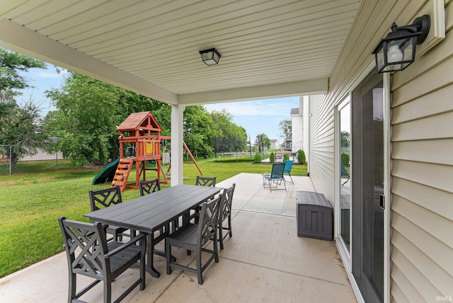 1114 Mosaic St, Huntertown, IN 46748 - view of patio / terrace with outdoor dining area, a playground, and a trampoline