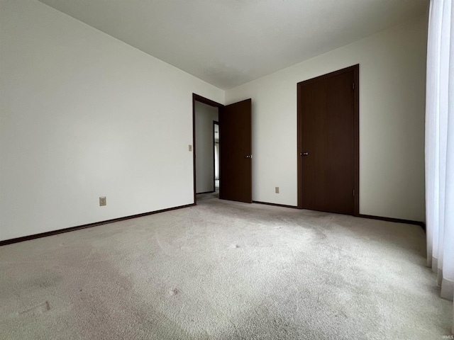 1140 Carlisle Dr, Jasper, IN 47546 - empty room featuring light colored carpet and baseboards
