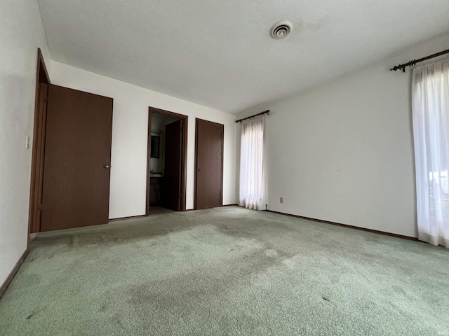 1140 Carlisle Dr, Jasper, IN 47546 - unfurnished bedroom featuring carpet floors and baseboards
